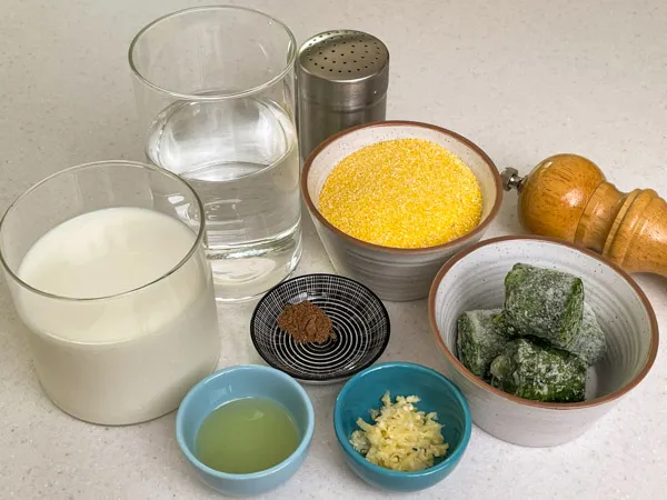 All ingredients used in the spinach polenta recipe in containers