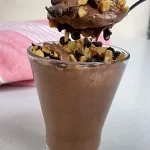 Chocolate Chia pudding made from chia, peanut butter in. a glass. jar